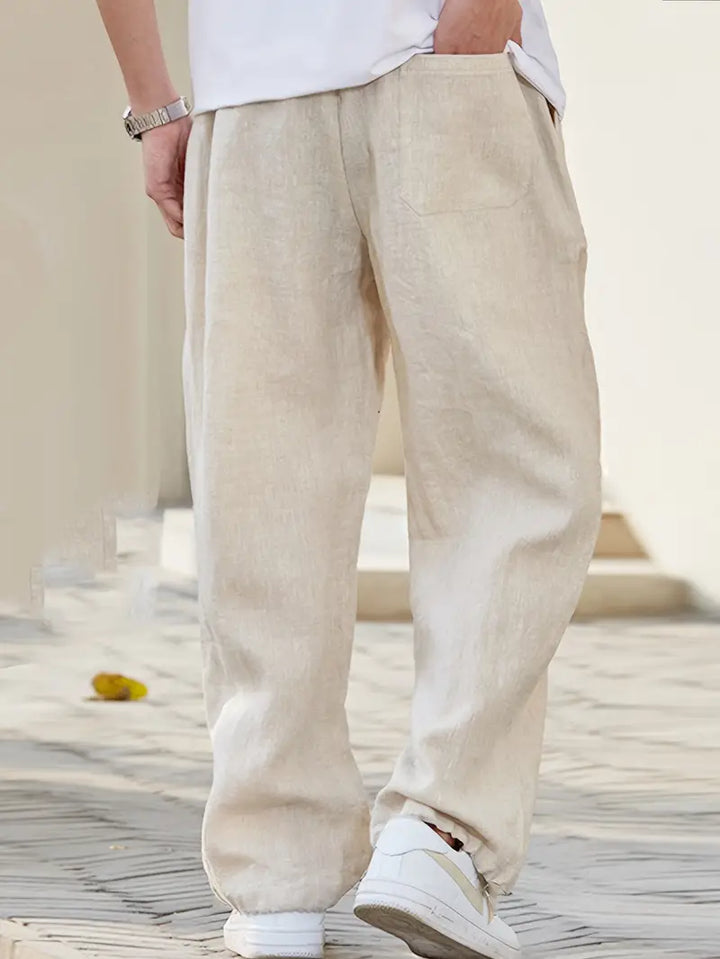 Męskie lniane spodnie typu wide leg, lekkie, oddychające, nowoczesny design zapewniający letni komfort, elegancki styl casualowy