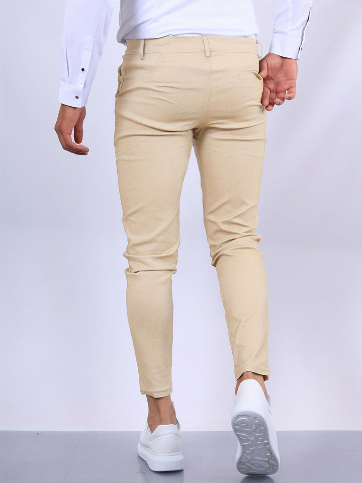 Eleganckie męskie spodnie slim fit, nowoczesny i dopasowany krój, idealne do profesjonalnego wyglądu i komfortu.