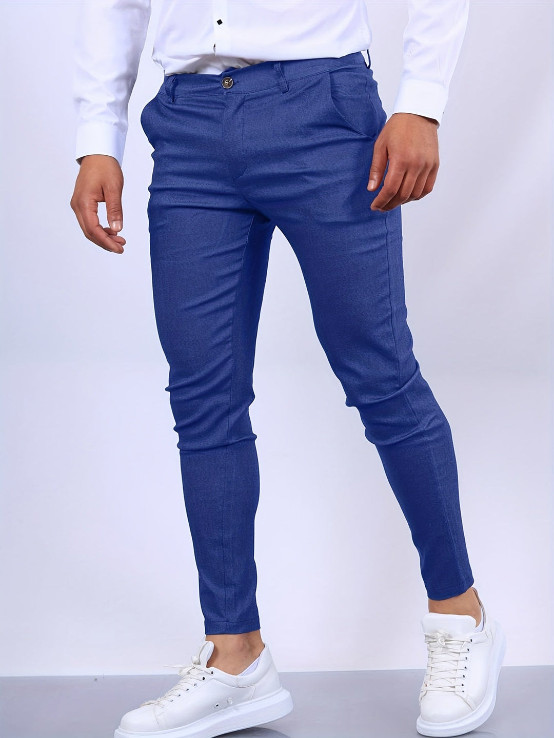Eleganckie męskie spodnie slim fit, nowoczesny i dopasowany krój, idealne do profesjonalnego wyglądu i komfortu.