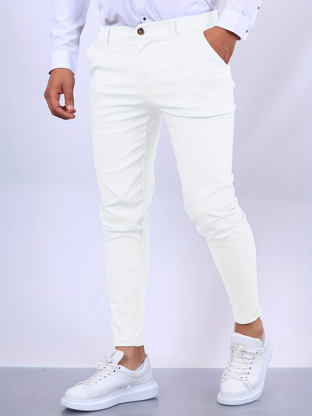 Eleganckie męskie spodnie slim fit, nowoczesny i dopasowany krój, idealne do profesjonalnego wyglądu i komfortu.