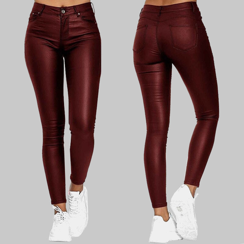 Damskie czarne skórzane spodnie slim fit z wysokim stanem, dopasowany krój dla eleganckiego wyglądu i maksymalnego komfortu.