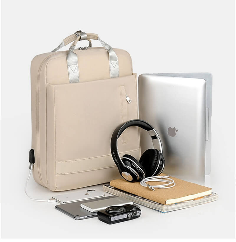 Duży plecak antykradzieżowy na laptopa 15.6 cala, z funkcją ładowania USB i wieloma przegrodami.