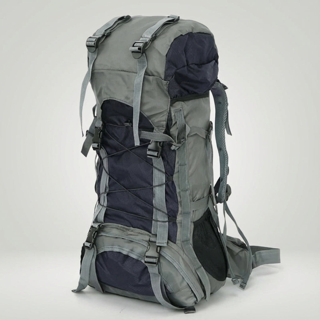 Plecak trekkingowy 60L Pathward, widok z boku, paski kompresyjne i kieszenie na butelki, sprzęt outdoor.