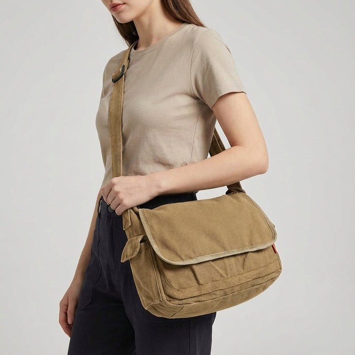 Torba na ramię vintage unisex z mocnego płótna, z klapą i klamrami, praktyczna i stylowa.