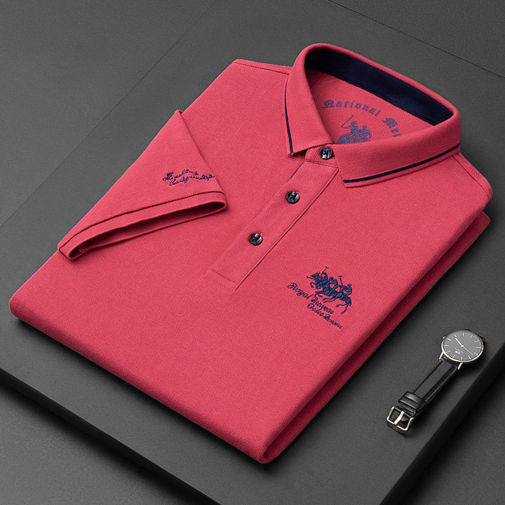 Męska koszulka polo w jednolitym kolorze z kontrastującym kołnierzykiem, elegancka i trwała.