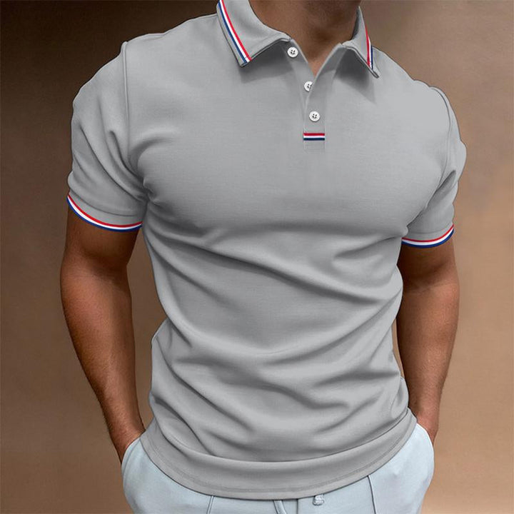 Męska koszulka polo z krótkim rękawem, gładka, z kołnierzem w paski, elegancka i wygodna, idealna do swobodnych i eleganckich stylizacji.