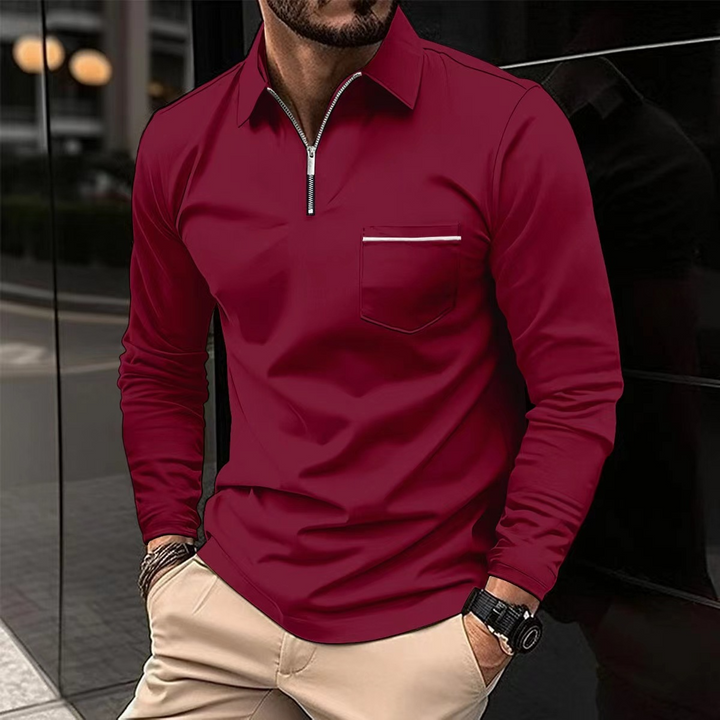 Męska koszulka polo z długim rękawem w kolorze granatowym, klasyczny styl, elegancki kołnierzyk polo, idealny na sezon przejściowy i zapewniający optymalny komfort.