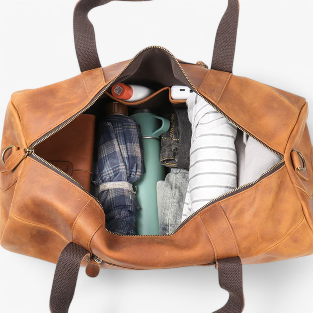 Wytrzymała torba podróżna duffel Gripwell, widok na elegancki materiał i solidne zamki.