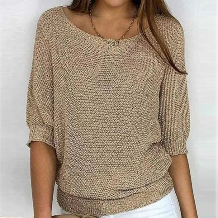 Elegancki sweter damski w kolorze fioletowym, z miękkiej dzianiny, idealny do stworzenia szykownego i wygodnego stroju.
