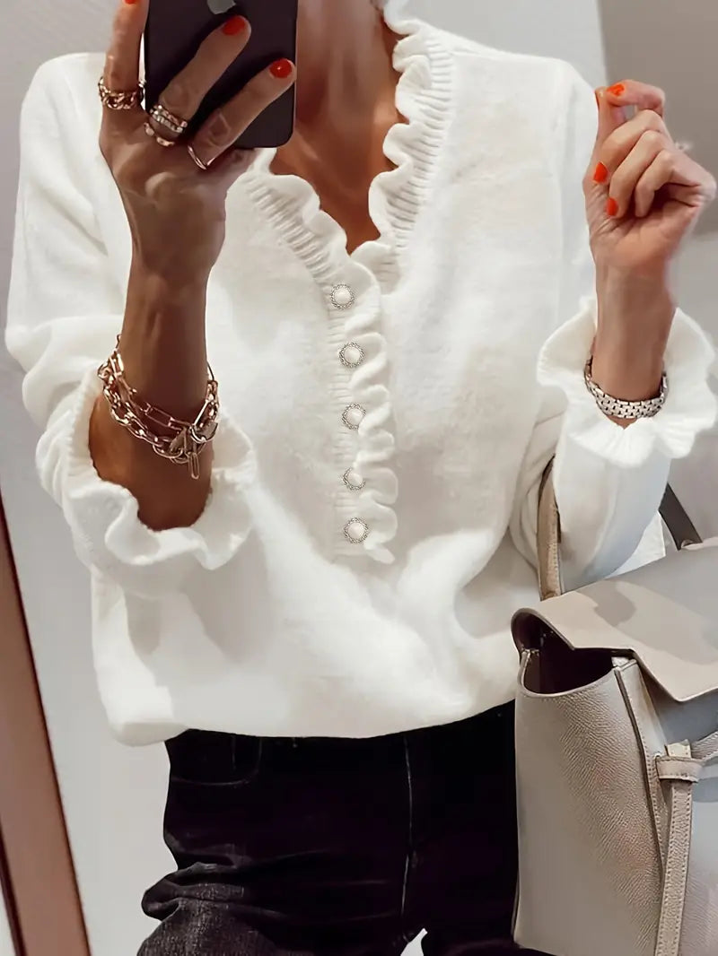 Wiosenny sweter damski z dekoltem V, bawełniany, w kolorze białym, elegancki, lekki i dopasowany, idealny do casualowych lub eleganckich stylizacji.