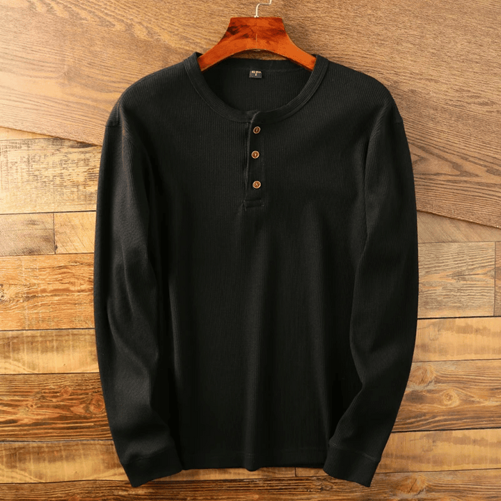 Męski sweter Henley Sommin z miękkiej bawełny, w neutralnym kolorze, z nowoczesnym kołnierzykiem, dla eleganckiego i komfortowego stylu.