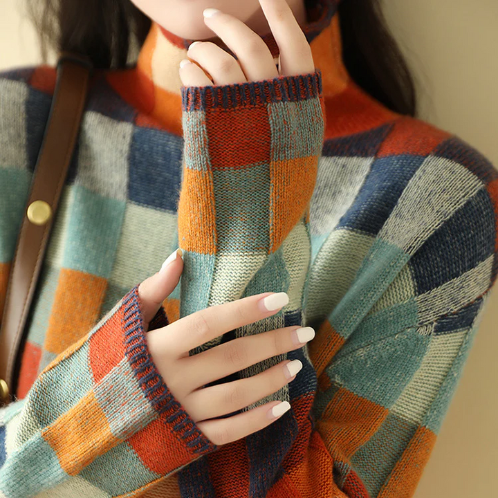 Szarobrązowy sweter oversize z miękkiego kaszmiru z golfem, idealny do wygodnego i eleganckiego stylu.