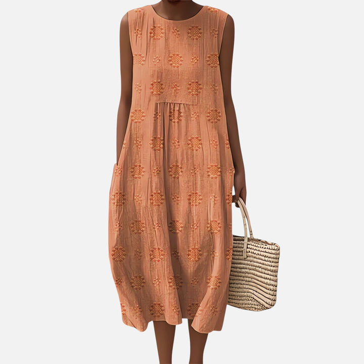 Szykowna bawełniana sukienka boho, midi, bez rękawów, o swobodnym kroju, z kieszeniami, geometrycznym wzorem, idealna na lato.