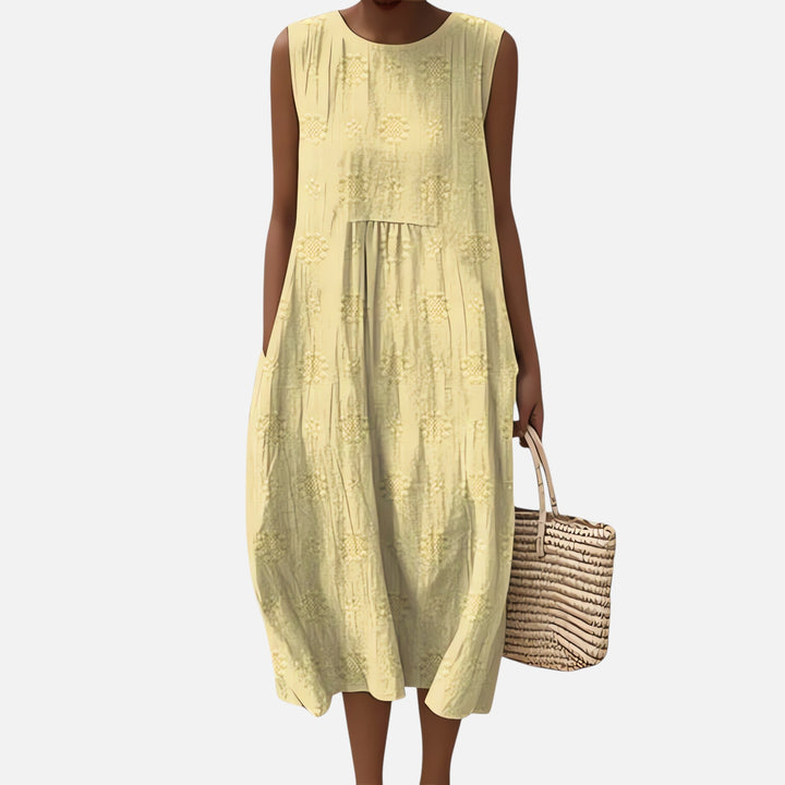 Szykowna bawełniana sukienka boho, midi, bez rękawów, o swobodnym kroju, z kieszeniami, geometrycznym wzorem, idealna na lato.
