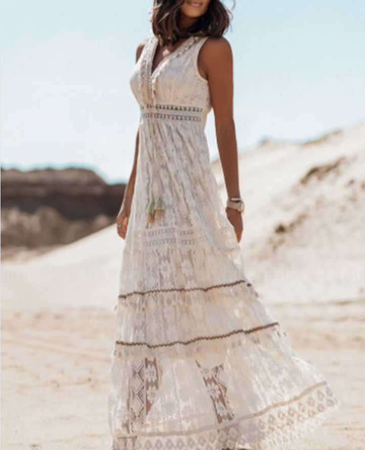 Płynna sukienka boho Agatha z wzorami boho, z bawełny i lnu, z haftowanymi detalami i frędzlami, luźny styl letni.
