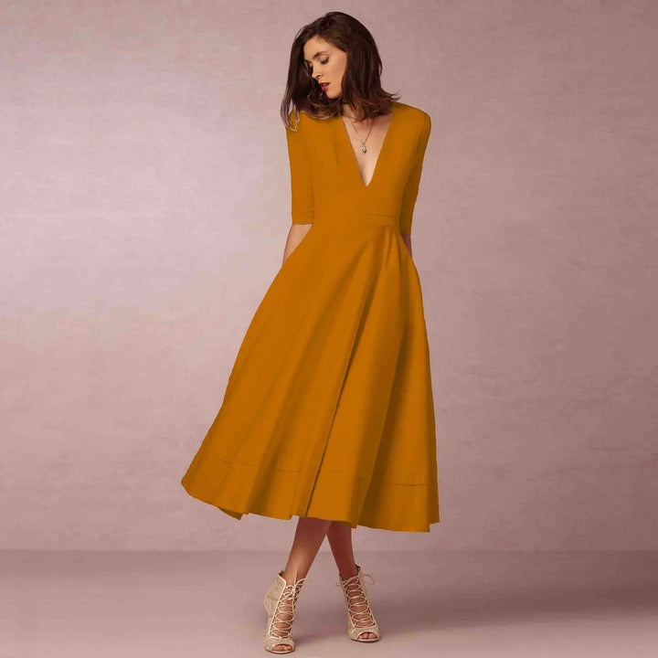Elegancka sukienka wieczorowa midi, wdzięczny krój, widok z przodu, idealna na specjalne okazje, nowoczesny design