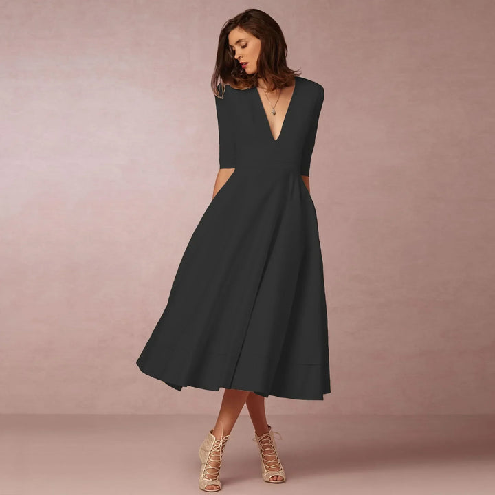 Elegancka sukienka wieczorowa midi, wdzięczny krój, widok z przodu, idealna na specjalne okazje, nowoczesny design