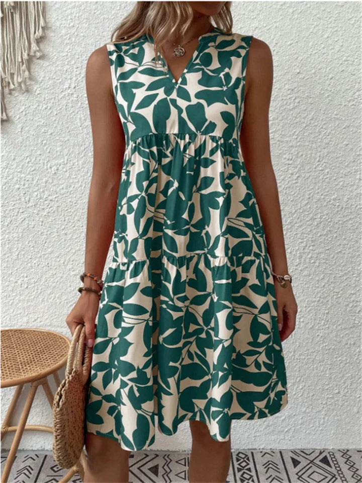 Elegancka letnia sukienka w kwiaty, fason A-line, lekka bawełna, rozmiary L do XXL, idealna na letnie wyjścia.