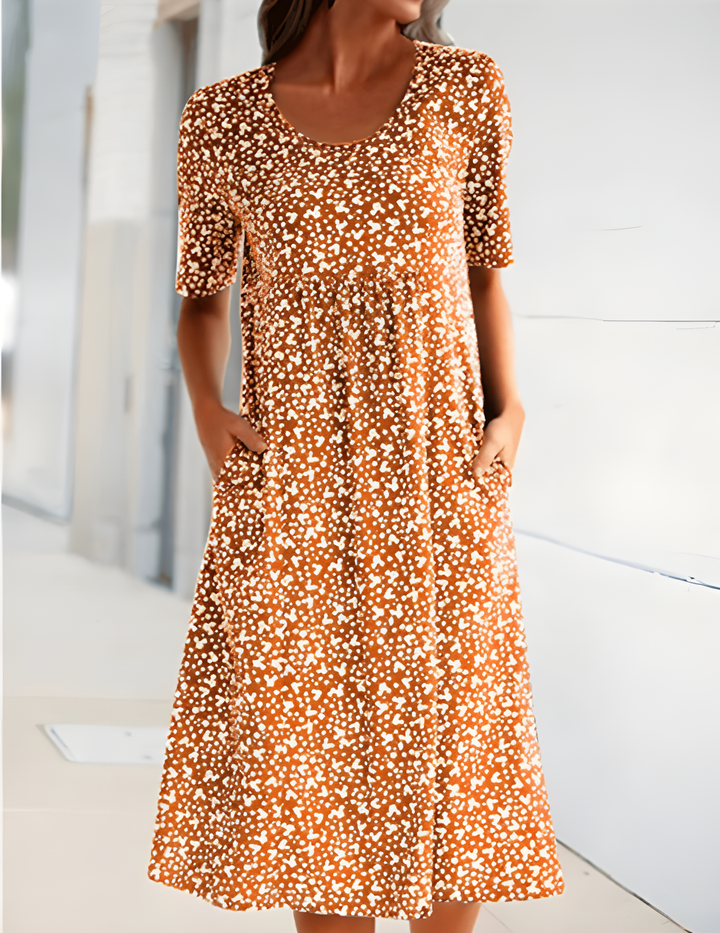 Lekka letnia sukienka Sophie, elegancka z oddychającego materiału, nowoczesny design, idealna na niezobowiązujące letnie wyjścia.