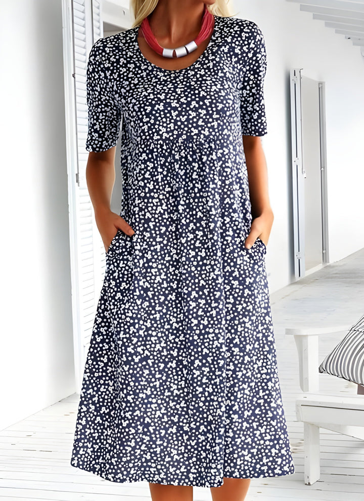 Lekka letnia sukienka Sophie, elegancka z oddychającego materiału, nowoczesny design, idealna na niezobowiązujące letnie wyjścia.