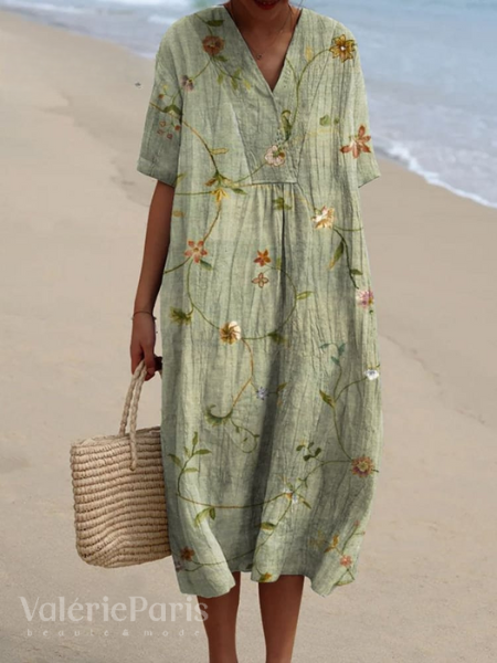 "Robe d'été Odile en coton-lin, motifs floraux, coupe élégante et confortable, idéale pour vos journées estivales."