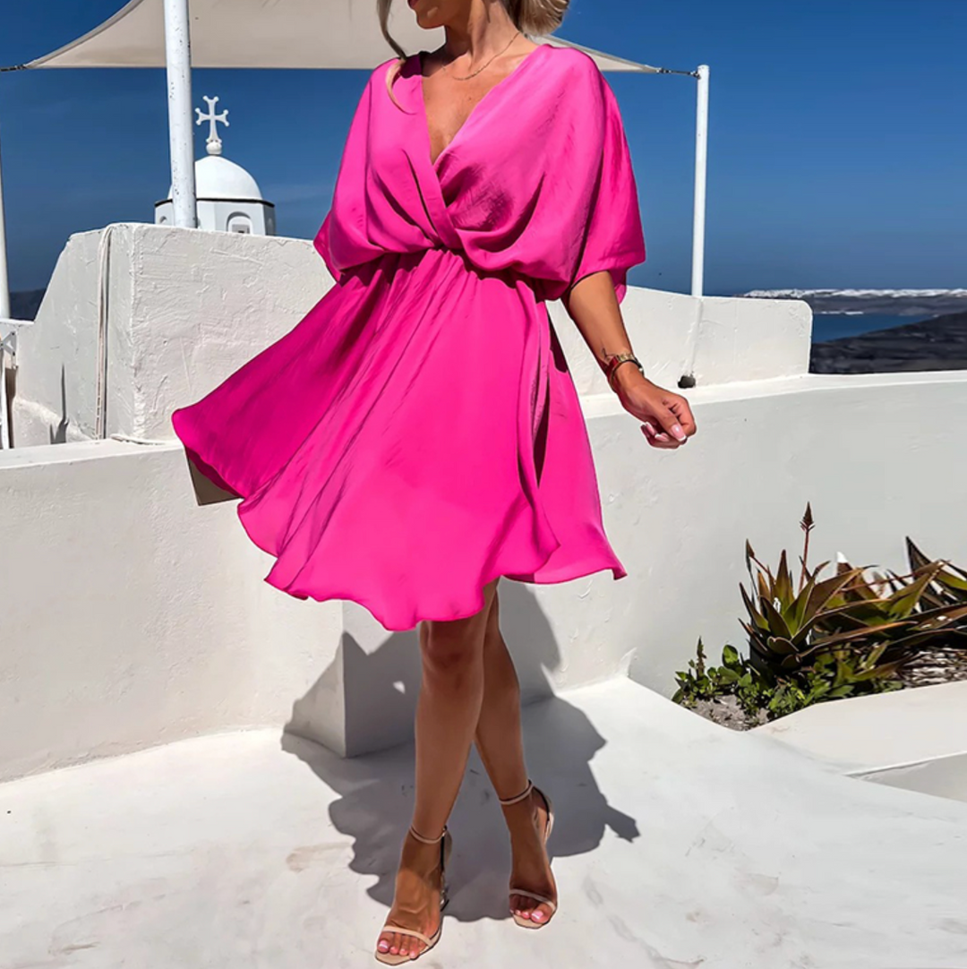 Elegancka sukienka ROSE w ciemnozielonym kolorze, z subtelnymi detalami i stylowym krojem, idealna na każdą okazję.