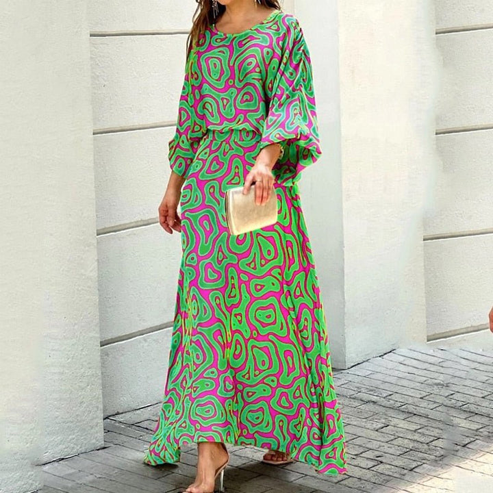 Elegancka letnia sukienka midi damska, lekki materiał, stylowy krój, żywy kolor, idealna na upalne dni, komfort i wyrafinowanie.