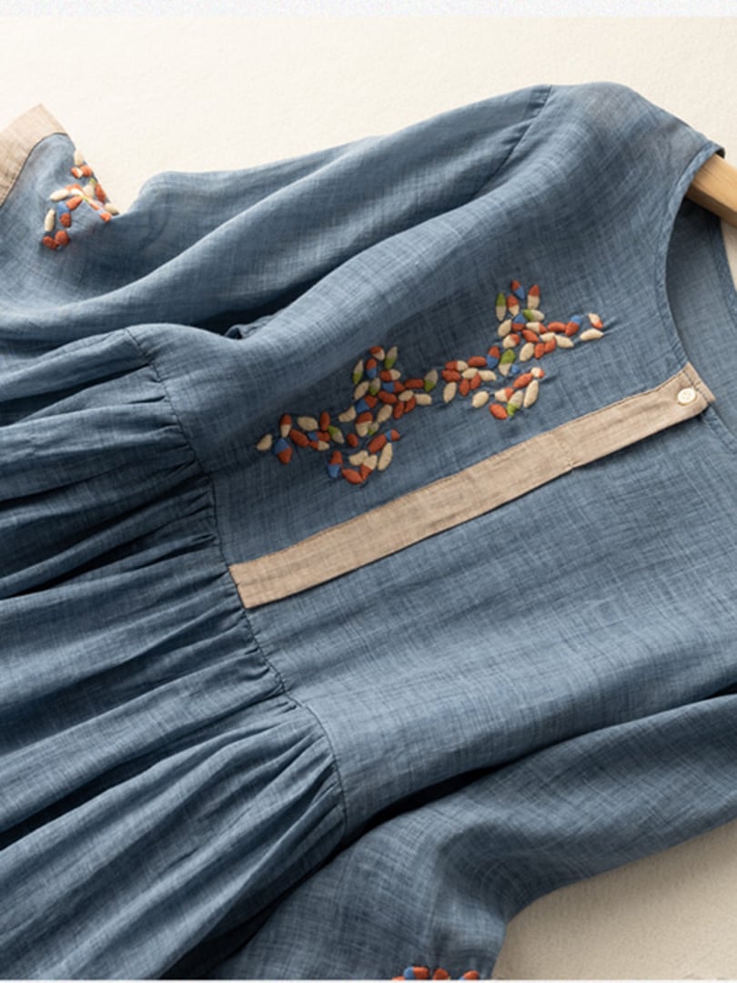 Etniczna sukienka damska z bawełny i lnu z delikatnymi haftami, luźnym krojem, elegancka i w stylu boho.