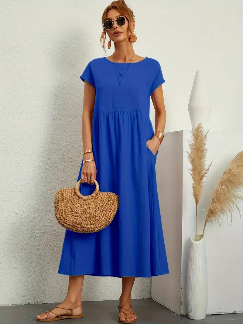 Elegancka damska sukienka lniana premium z kieszeniami, w uniwersalnych kolorach, na każdą porę roku, zapewniająca niezwykły komfort.