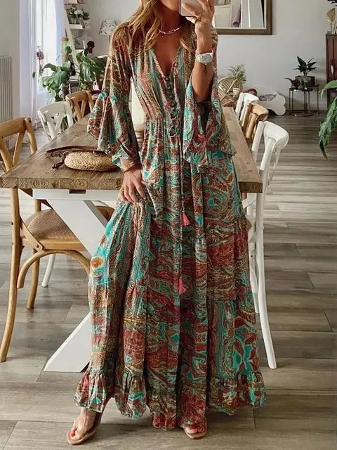 Długa sukienka boho damska, szykowna, na lato, z rozkloszowanymi rękawami, kwiatowymi wzorami, podkreślającym figurę wysokim stanem i eleganckim dekoltem w serek.