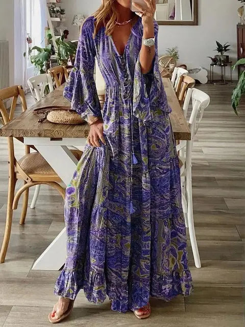 Długa sukienka boho damska, szykowna, na lato, z rozkloszowanymi rękawami, kwiatowymi wzorami, podkreślającym figurę wysokim stanem i eleganckim dekoltem w serek.