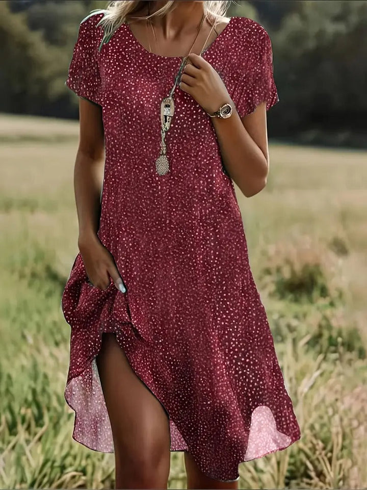 Letnia sukienka mini damska Maëlle, elegancka i wygodna, idealna na słoneczne dni.