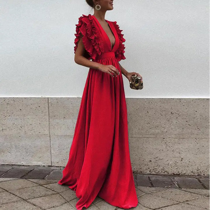 Elegancka sukienka maxi damska z falbankami i głębokim dekoltem, idealna na letnie wieczory i specjalne okazje.