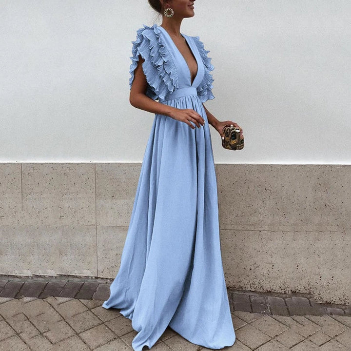 Elegancka sukienka maxi damska z falbankami i głębokim dekoltem, idealna na letnie wieczory i specjalne okazje.
