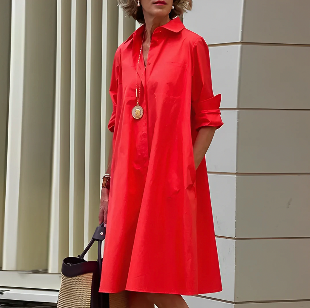 Elegancka letnia sukienka midi z lekkiej tkaniny, dopasowany krój, żywy kolor, idealna na komfort i styl.