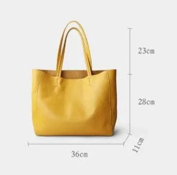 Czarna shopperka ze skóry naturalnej, elegancka i przestronna, dodatek dla nowoczesnej kobiety.