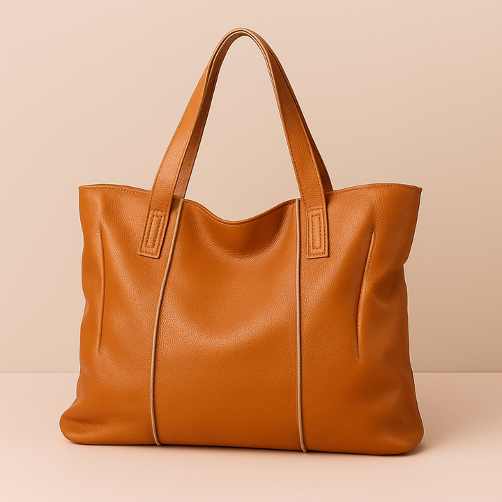 Duża shopperka ze skóry, kolor camel, z zamkiem, idealna dla nowoczesnej i eleganckiej kobiety.
