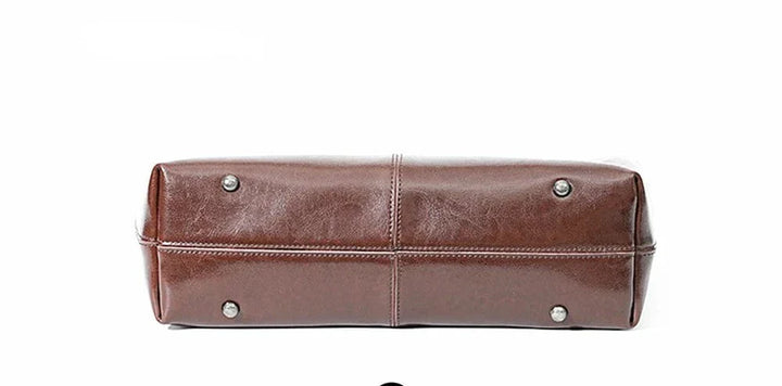 Brązowa damska torba na laptopa z prawdziwej skóry, nowoczesna, wytrzymała i elegancka, idealna do pracy lub na studia.
