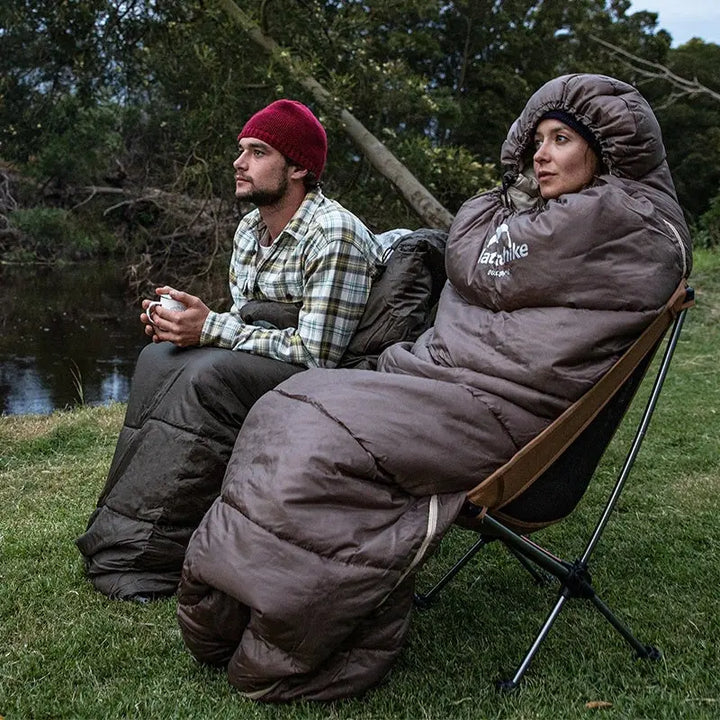 Ultralekki szary śpiwór outdoorowy, ergonomiczna konstrukcja, optymalna izolacja termiczna do biwakowania i trekkingu.