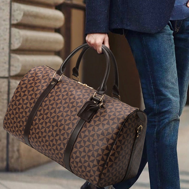 Luksusowa torba podróżna męska ze skóry, elegancka i solidna, z dużą przestrzenią, idealna na każdą podróż.