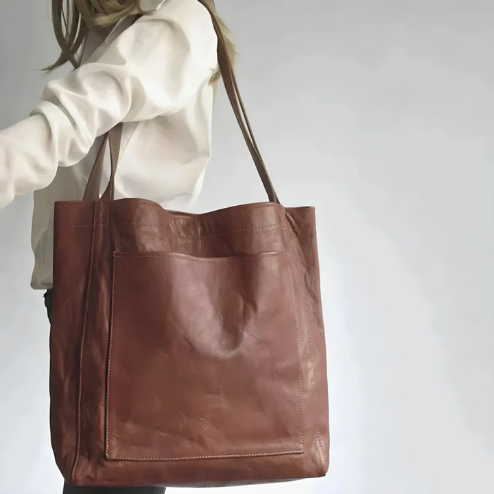 Elegancka, ręcznie robiona skórzana torba na ramię w kolorze ciemnobrązowym, idealna na co dzień i na specjalne okazje