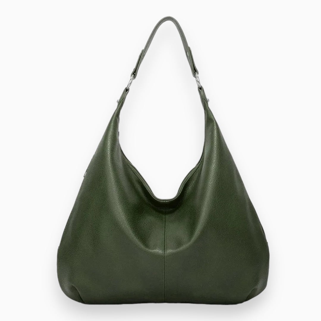 Szykowna i przestronna torebka hobo ze skóry wielbłądowej, o elastycznym i nowoczesnym designie, idealna na akcesoria dla miejskich i eleganckich kobiet.