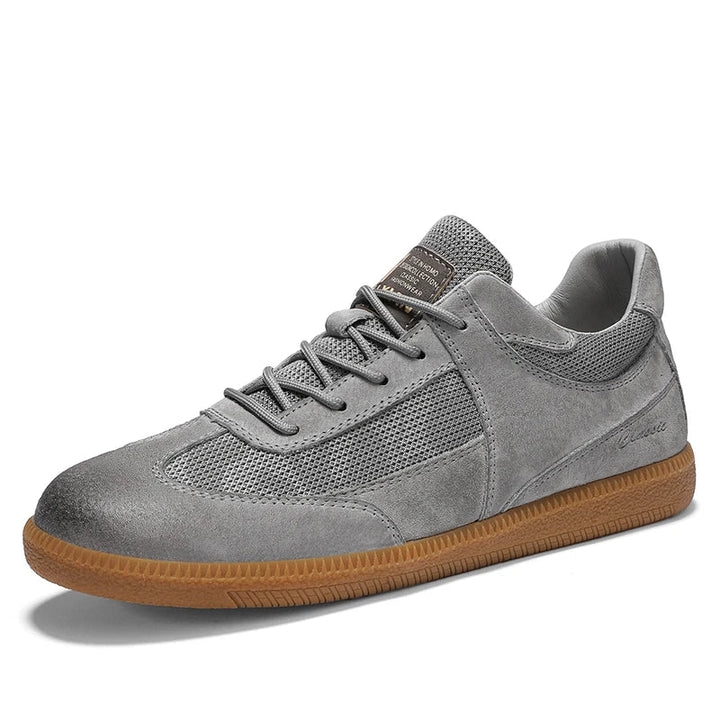 Męskie sneakersy z włoskiej skóry, eleganckie i komfortowe, czarny design, antypoślizgowa podeszwa.