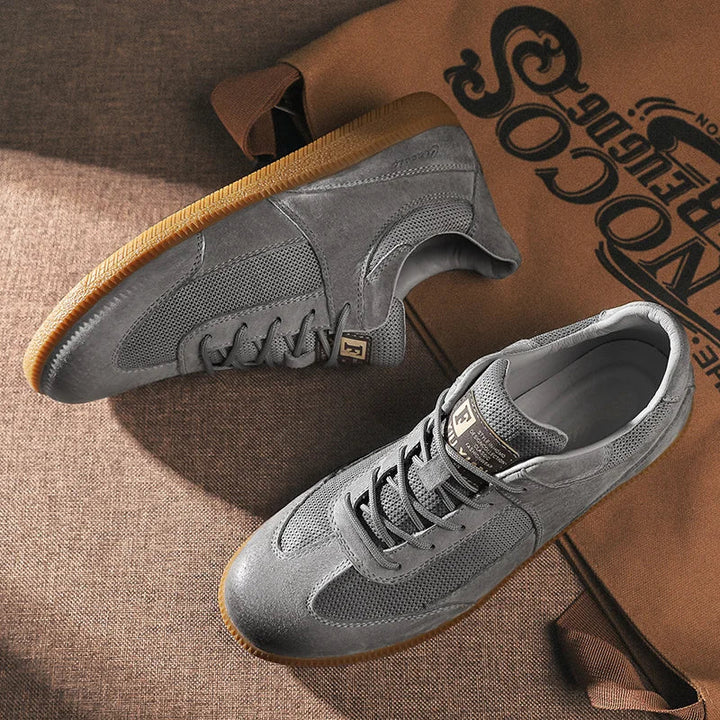 Męskie sneakersy z włoskiej skóry, eleganckie i komfortowe, czarny design, antypoślizgowa podeszwa.