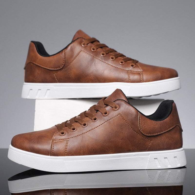 Eleganckie i wygodne męskie sneakersy, minimalistyczny design, stonowany kolor, wysokiej jakości materiały, antypoślizgowa podeszwa.