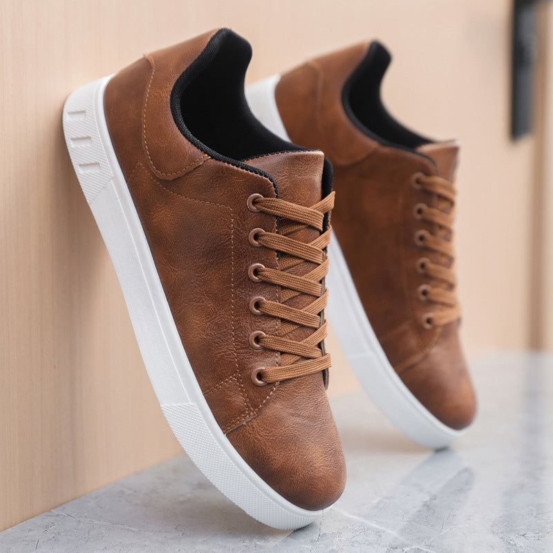 Eleganckie i wygodne męskie sneakersy, minimalistyczny design, stonowany kolor, wysokiej jakości materiały, antypoślizgowa podeszwa.
