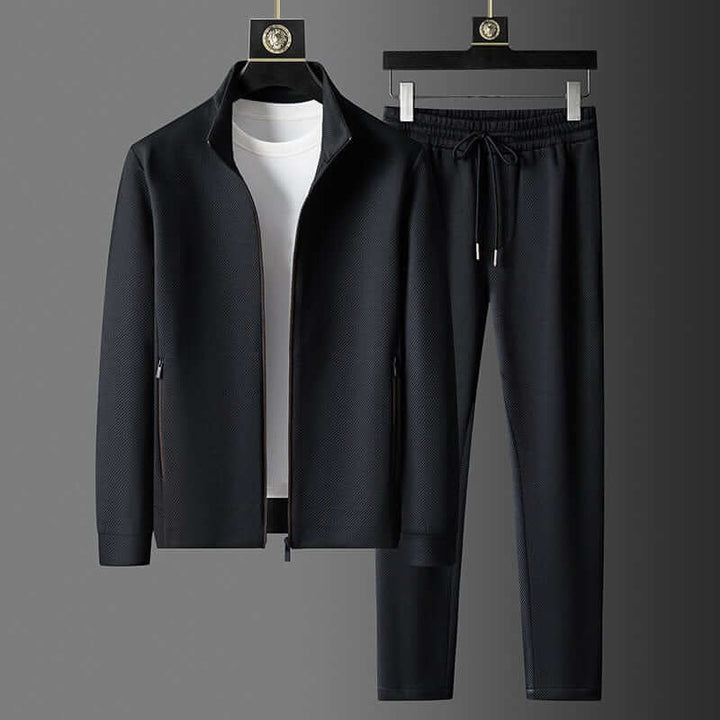 Stylowy, nowoczesny dres męski, z oddychającej tkaniny i dopracowanym krojem, z eleganckimi detalami, idealny do sportu i wyjść miejskich.