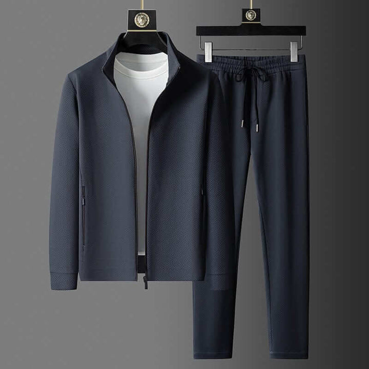 Stylowy, nowoczesny dres męski, z oddychającej tkaniny i dopracowanym krojem, z eleganckimi detalami, idealny do sportu i wyjść miejskich.