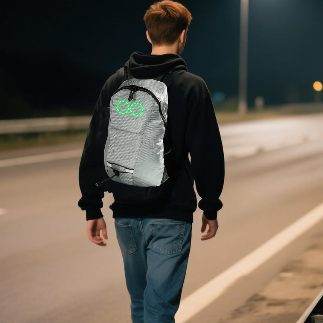 Nocny plecak LED Nexora, uniseks, zwiększający widoczność i bezpieczeństwo rowerzysty.