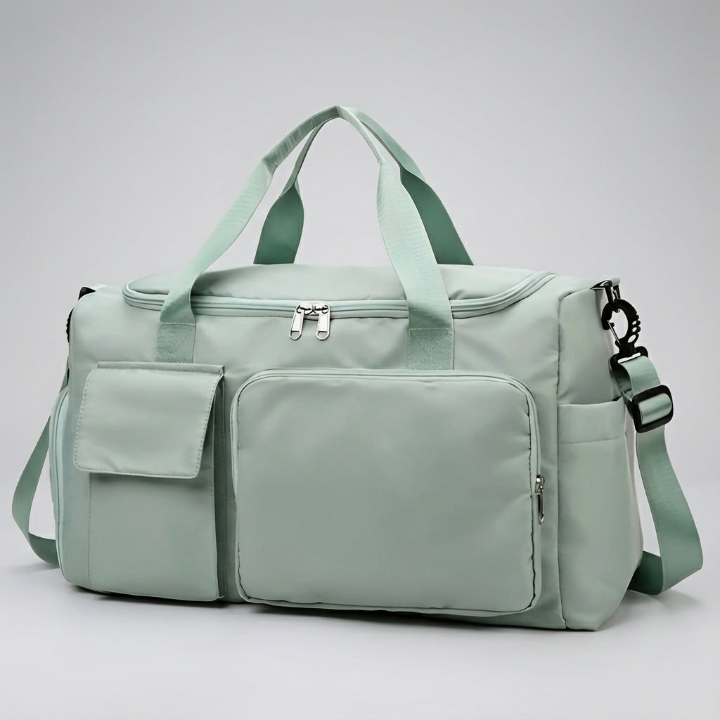 Elegancka torba weekendowa unisex na ramię, z przegrodą na buty. Ułatwia organizację i podróżowanie.
